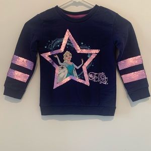 Disney Frozen shirt with sequins that flip colours. Size 4